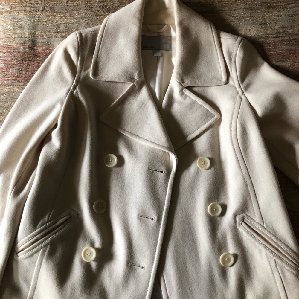 Cream colored pea coat hip length